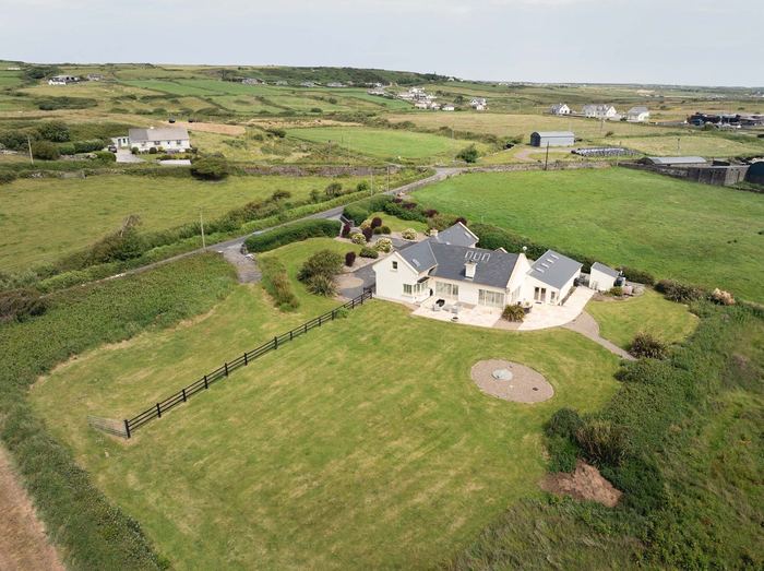Aerial view of the grounds and surrounding fields